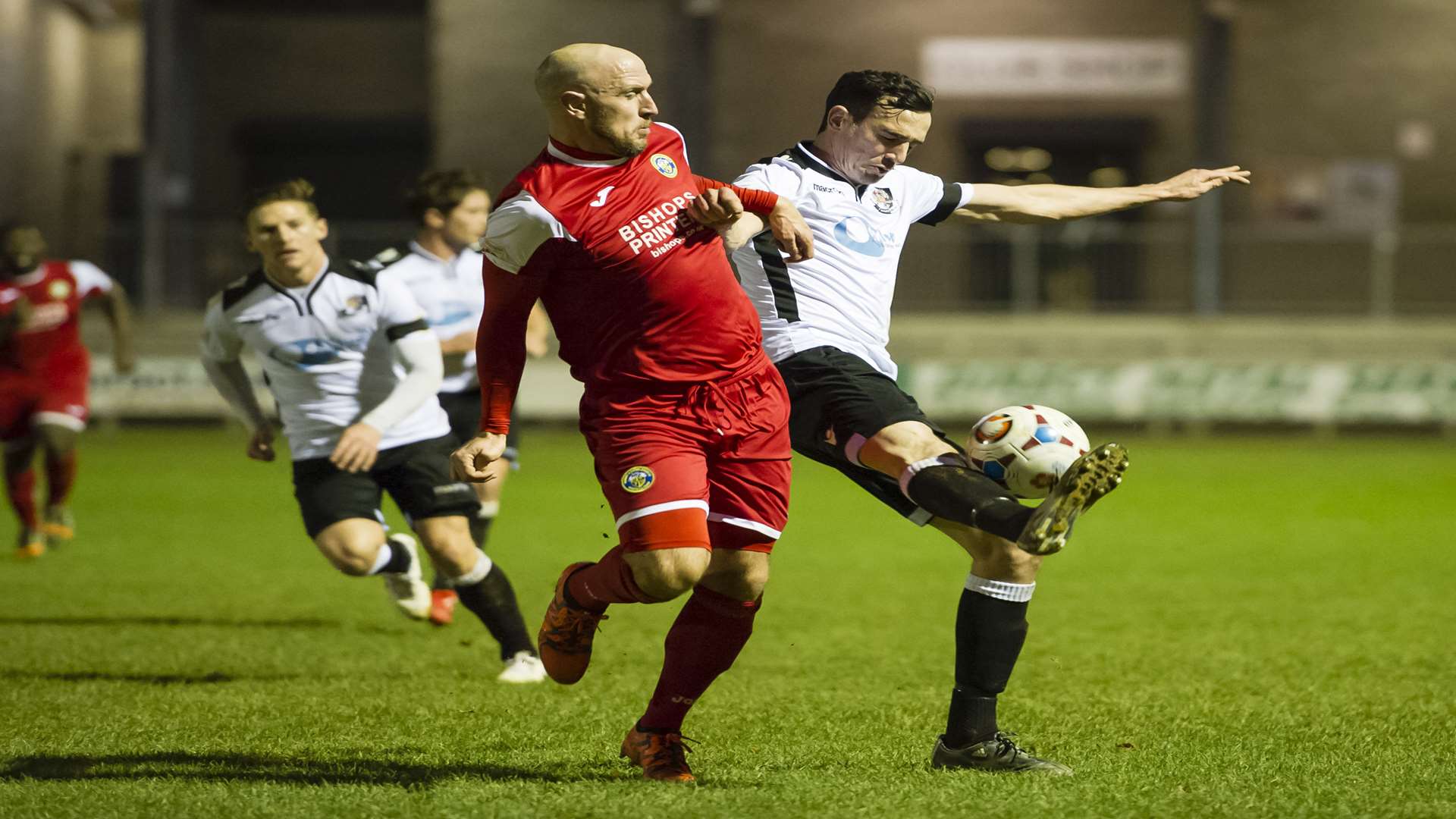 Dartford goalscorer Danny Harris battles with Havant's Lee Molyneaux Picture: Andy Payton