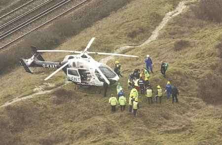 The man is placed on a stretcher. Picture: DAVE DOWNEY