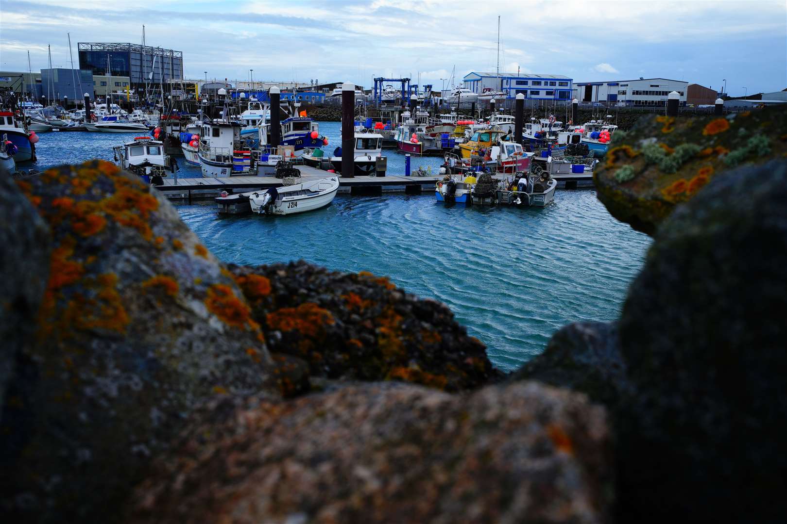 Fishing boats remain in the harbour at St Helier, Jersey, as fishermen and fisheries on the island wind down trading ahead of political talks and slowly ease off fishing (Ben Birchall/PA)