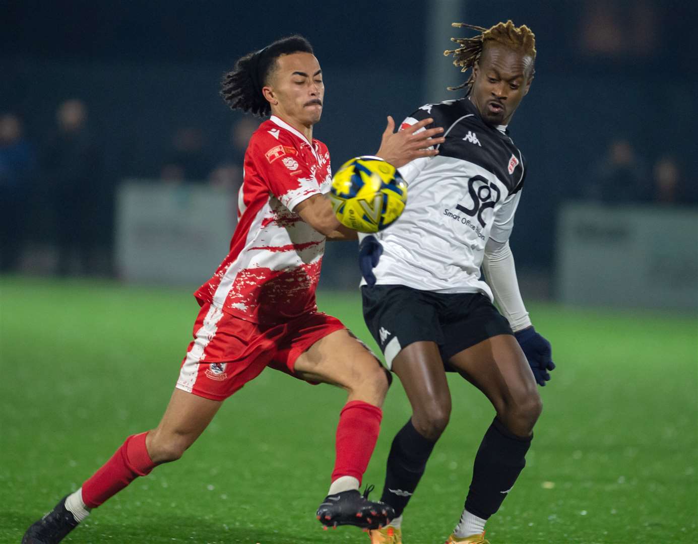 Ramsgate midfielder TJ Jadama does battle with Toby Ajala of Faversham. Picture: Ian Scammell