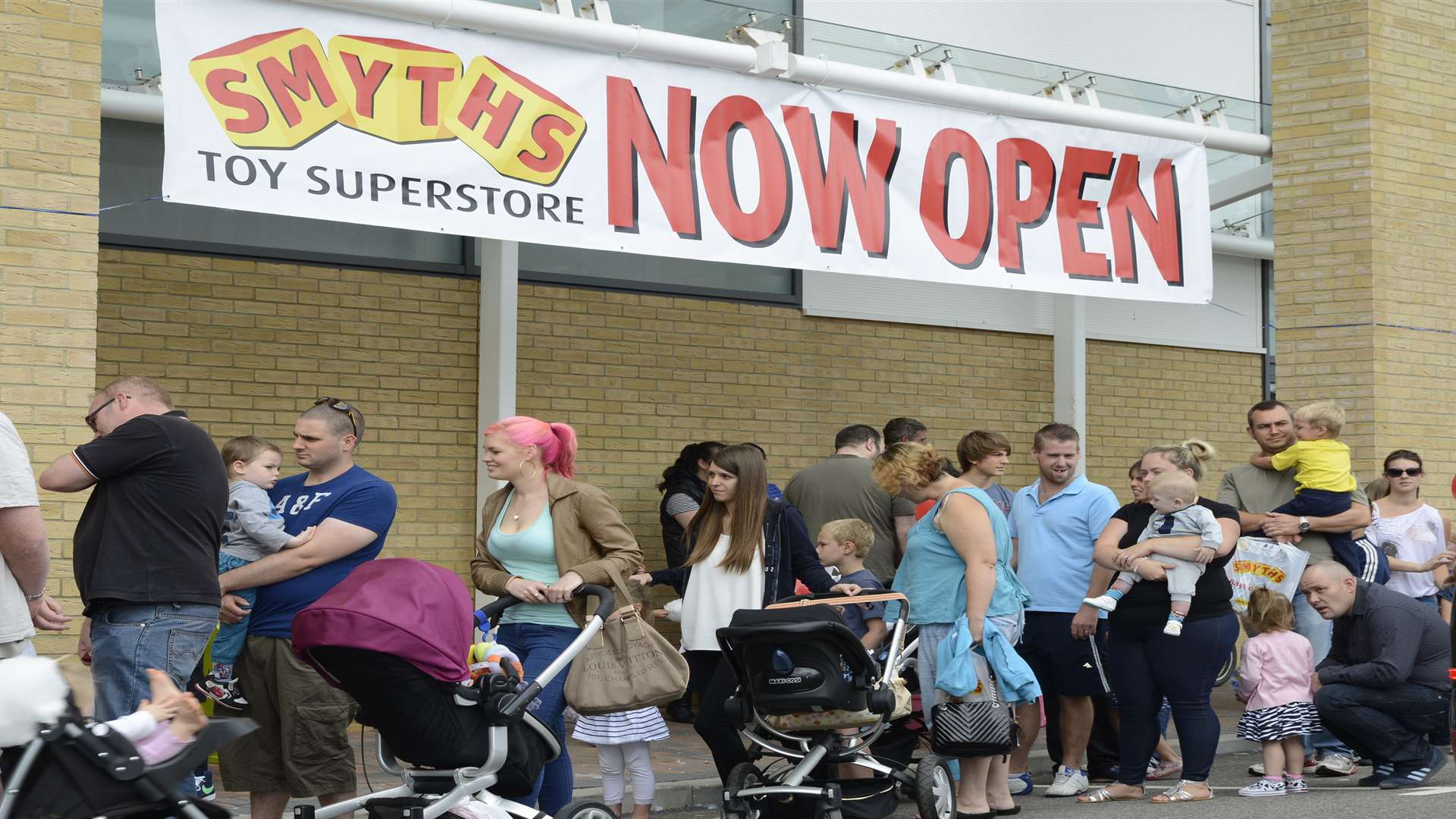 Queues outside the Smyths store opening at the South Aylesford Retail Park in 2013.