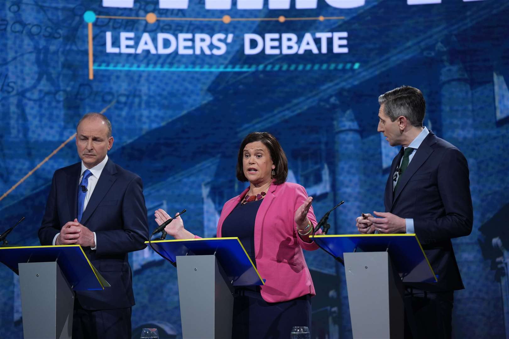 (left to right) Tanaiste and Fianna Fail Leader Micheal Martin, Sinn Fein leader Mary Lou McDonald and Taoiseach and Fine Gael leader Simon Harris during the final TV leaders’ debate (Niall Carson/PA)