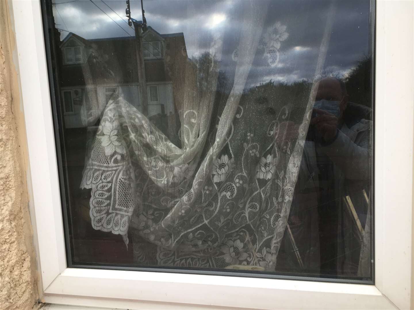 Smoke-damaged curtains at the flat at the former Plough Inn pub in Plough Road, Minster, Sheppey, which caught fire