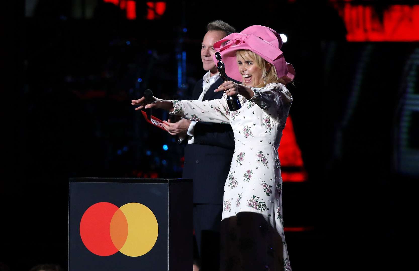 Paloma Faith and Kiefer Sutherland on stage at the Brit Awards 2020 (Isabel Infantes/PA)