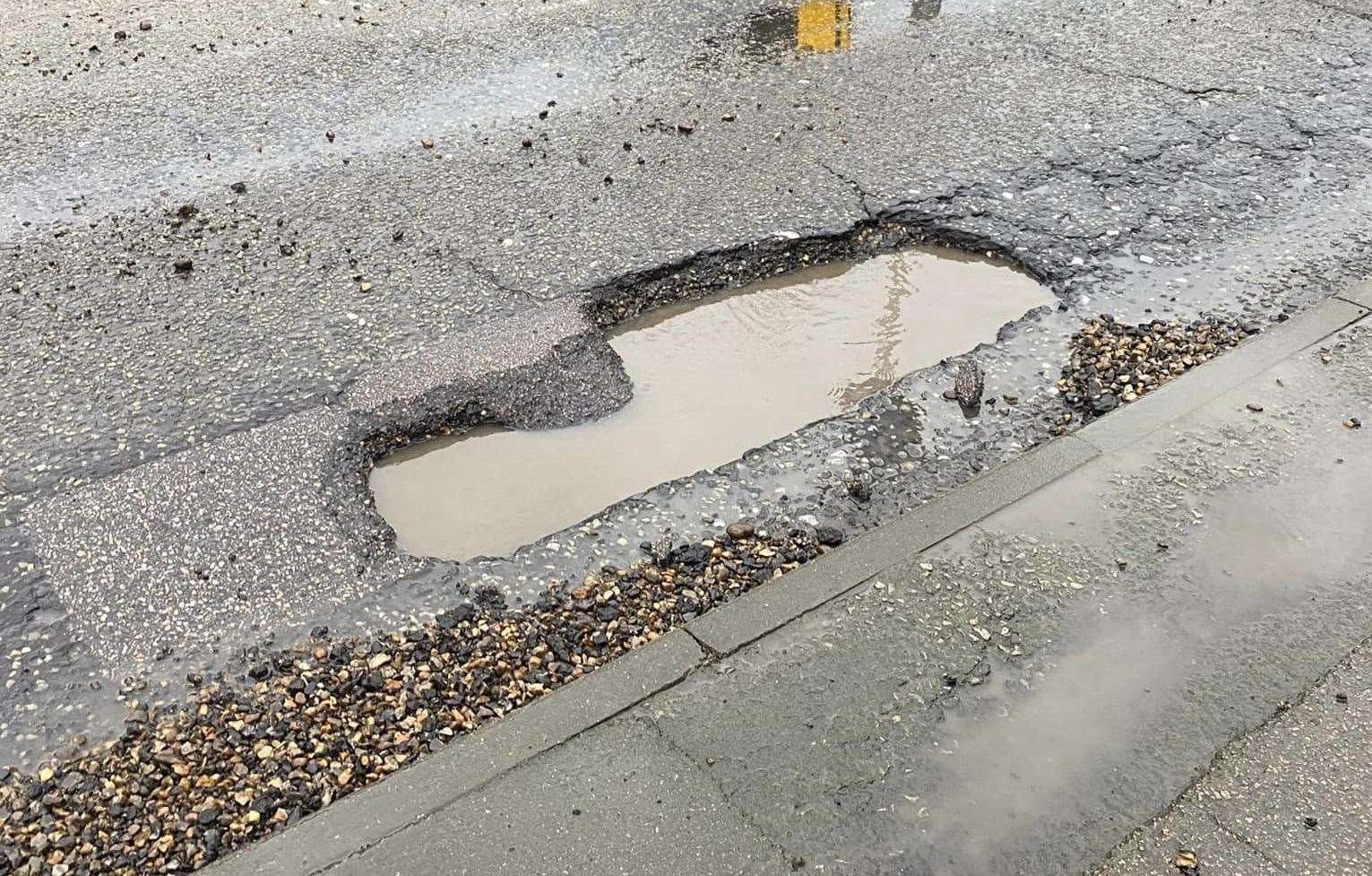 Dazie Warne damaged two tyres on this pothole in Ellingham Way in Ashford. Picture: Dazie Warne