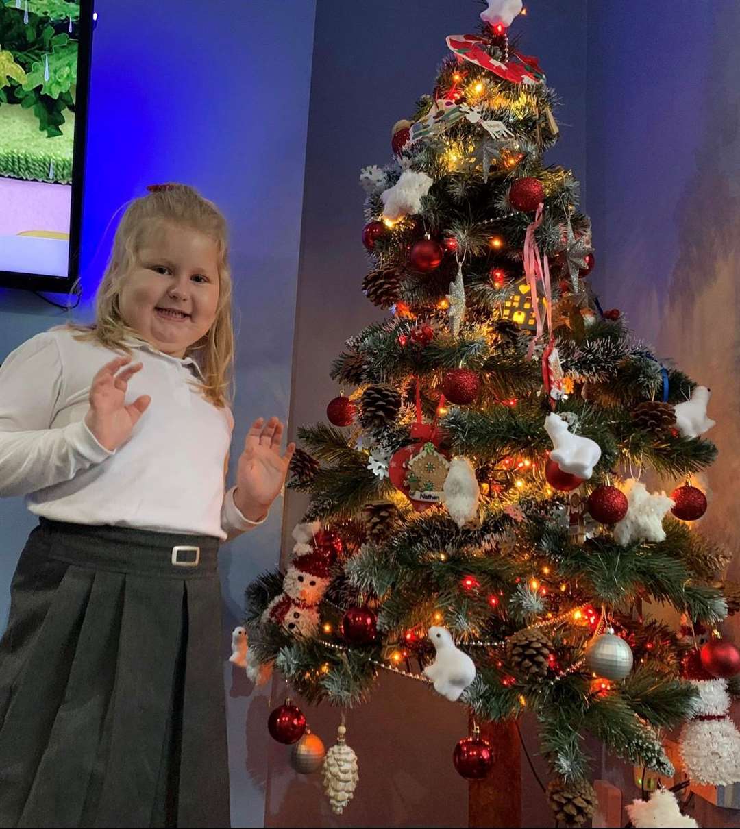 Maya Siek at home in Margate with the Christmas tree she decorated