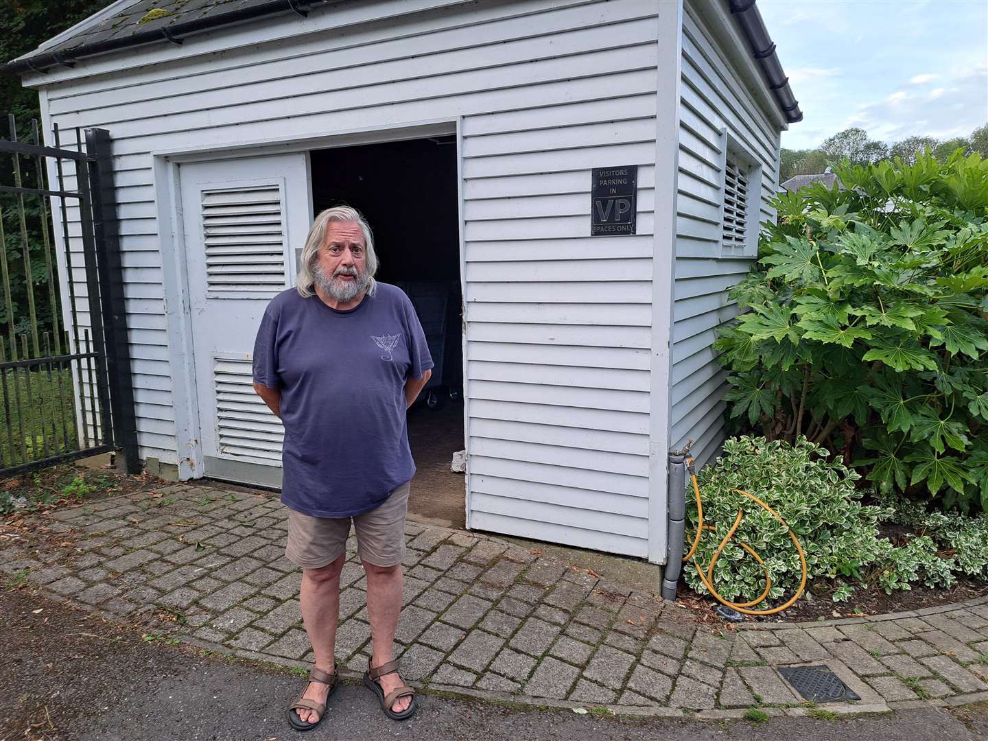 Tony Hemsted in front of the bin store at Hayle Mill in Tovil