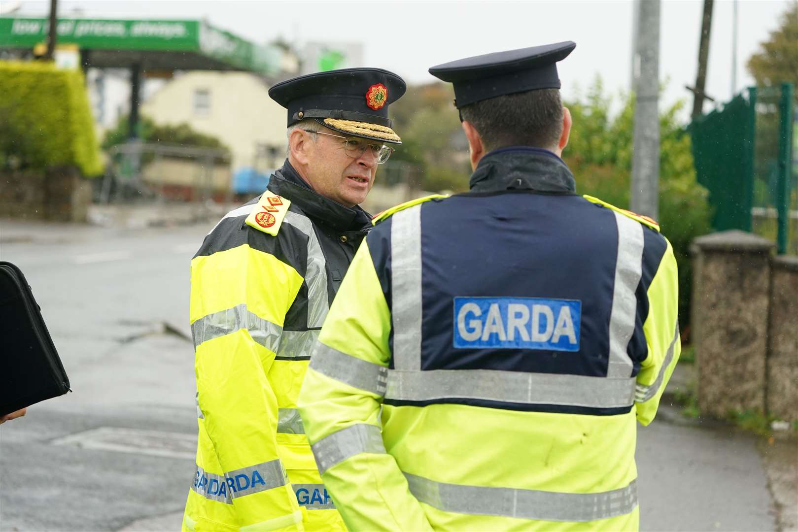 Garda Commissioner Drew Harris, left, at the scene of the explosion (Brian Lawless/PA)