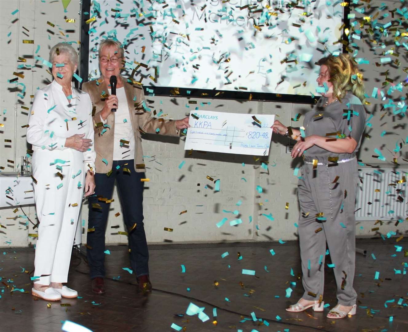 From left, Hilary Casey, secretary of Hythe Lawn Tennis Club, and club member Tracy West give a cheque to the Kent Kidney Patients Association on behalf of Hythe LTC