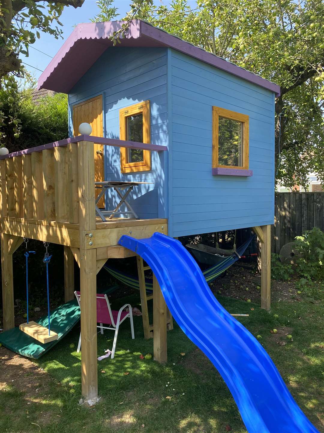 The treehouse features a hammock, a swing and a slide (Jason Kneen/PA)