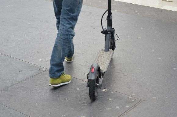 Two children attempted to steal a e-scooter. Stock Image