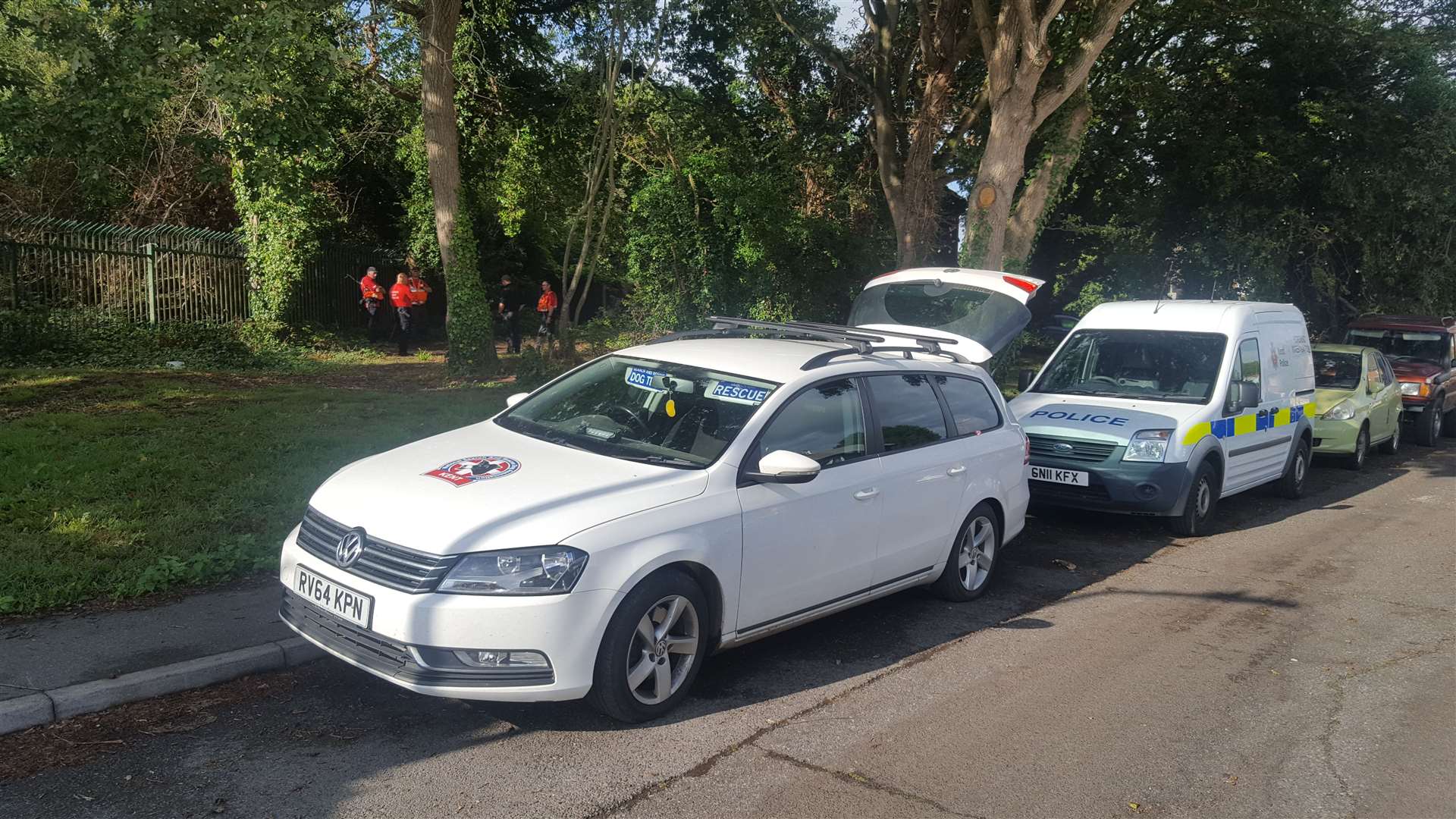 A number of emergency services vehicles parked up in Dickens Avenue