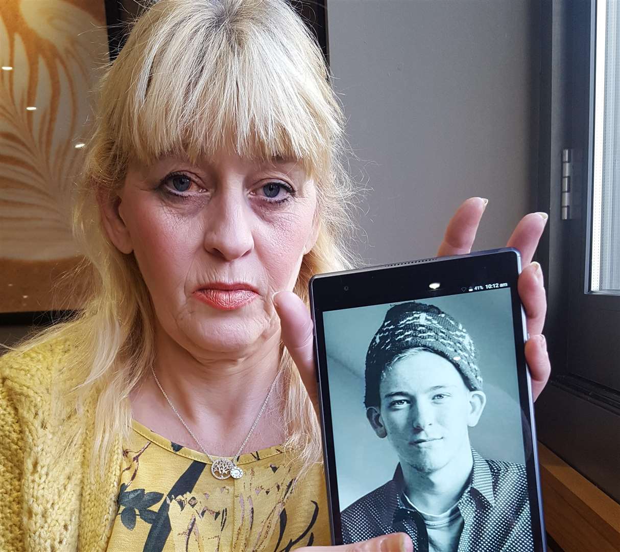 Pixie Nimmo with a photo of Ryan (6873265)