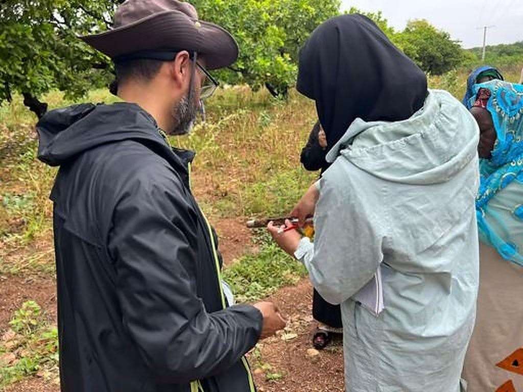 Attiya Shaukat (right) on a farming site in Nigeria (Attiya Shaukat/PA)