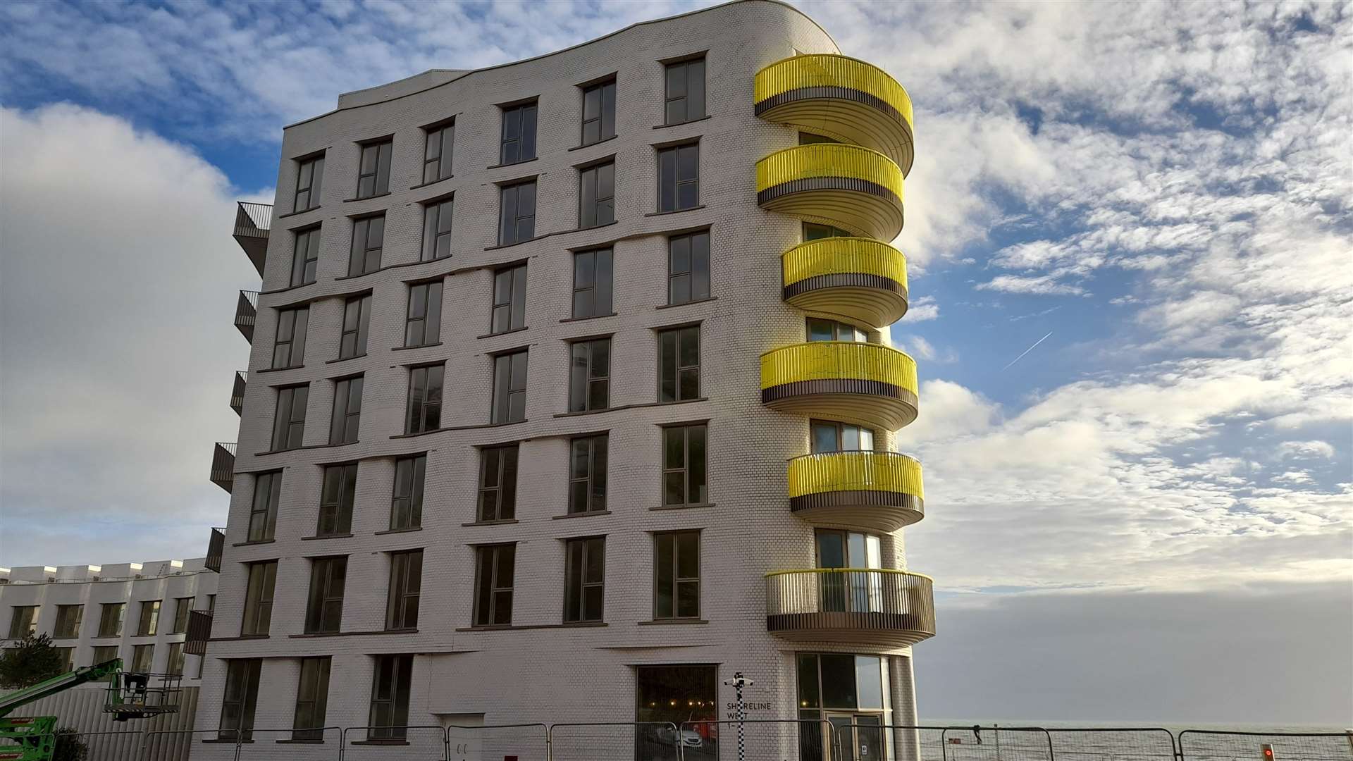 The yellow covers appeared on the balconies this week