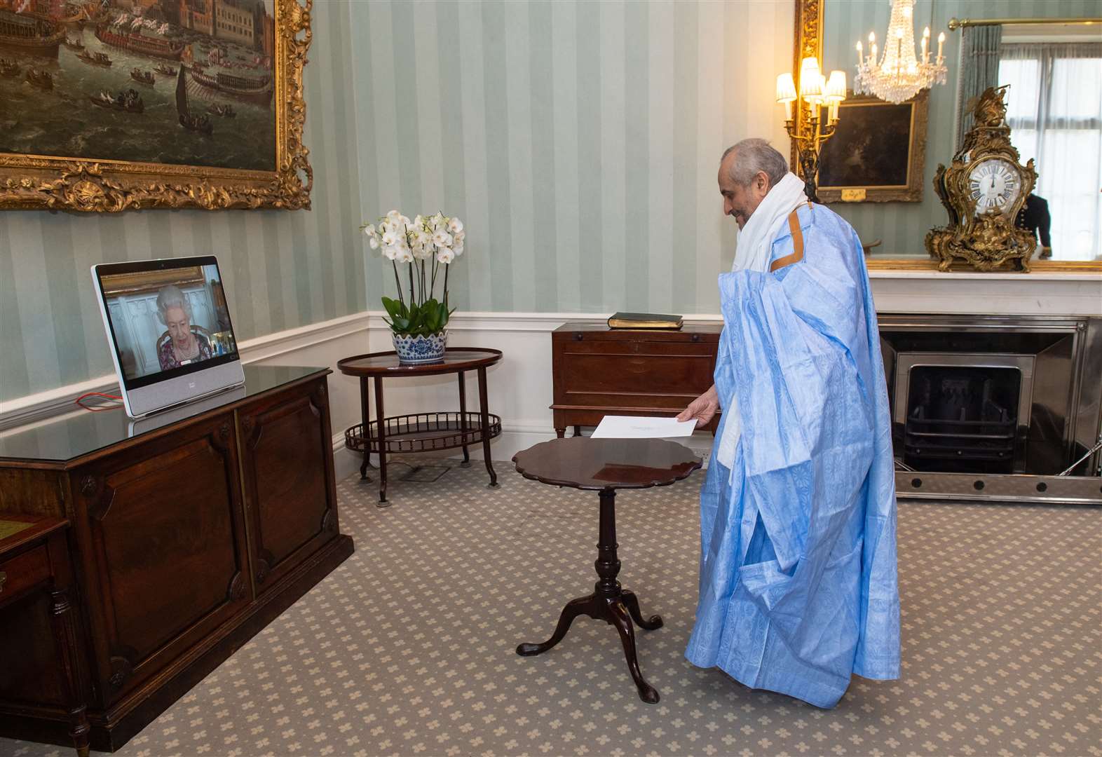 Mauritania’s ambassador Sidya Ould Elhadj at Buckingham Palace with the Queen at Windsor via video link (Dominic Lipinski/PA)