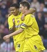 WINNER: Matt Holland and Jerome Thomas celebrate the captain's goal. Picture: MATT READING