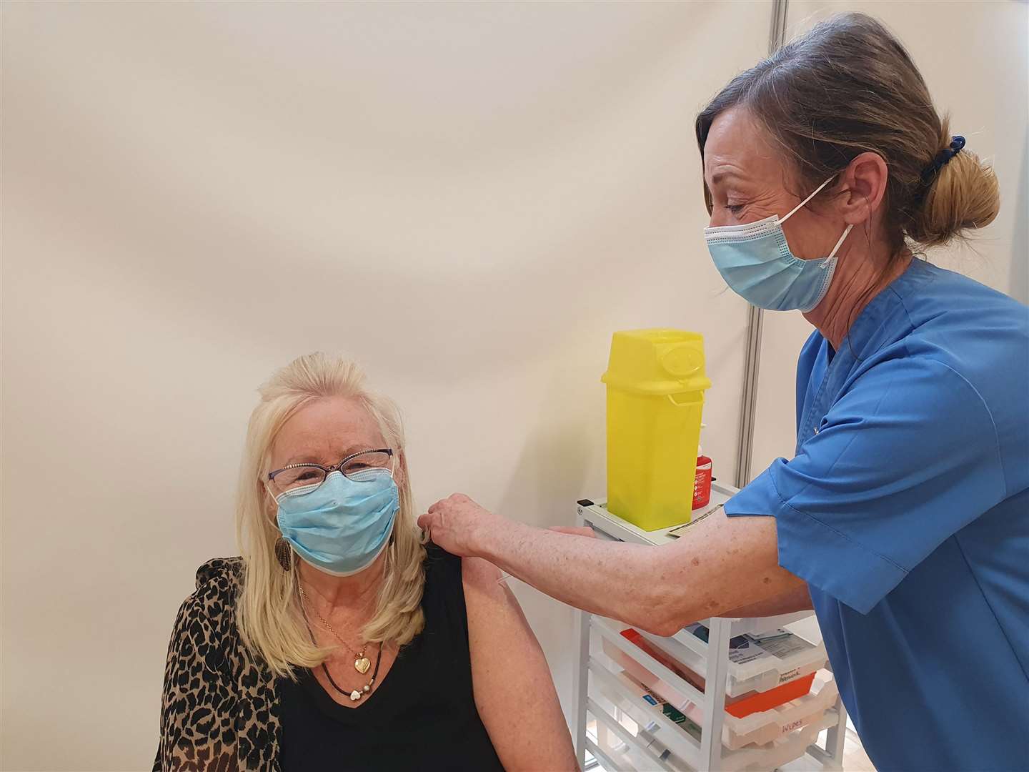 Aneira Thomas receiving the second dose of her Covid-19 jab at the mass vaccination centre at the Canolfan Gorseinon Centre (Swansea Bay University Health Board/PA)