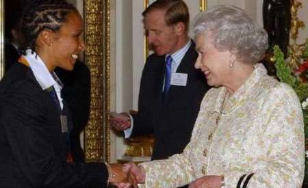 MAGIC: MOMENT: Big smiles from Kelly and the Queen. Picture: KIRSTY WIGGLESWORTH/ PRESS ASSOCIATION