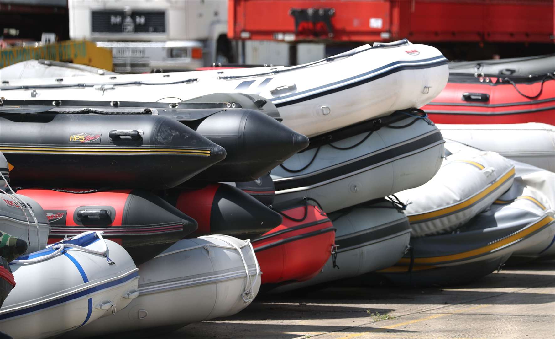 Boats in a secure compound in Dover which have been seized after being intercepted in the Channel (Gareth Fuller/PA)