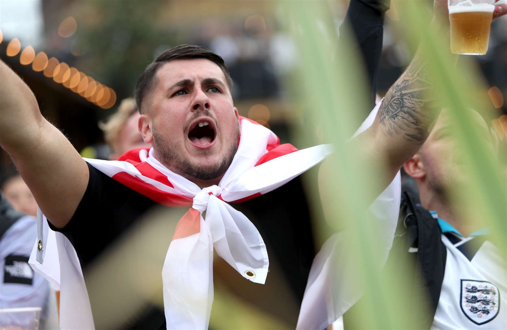 A happy fan at the Vinegar Yard pub in London (Kieran Cleeves/PA)