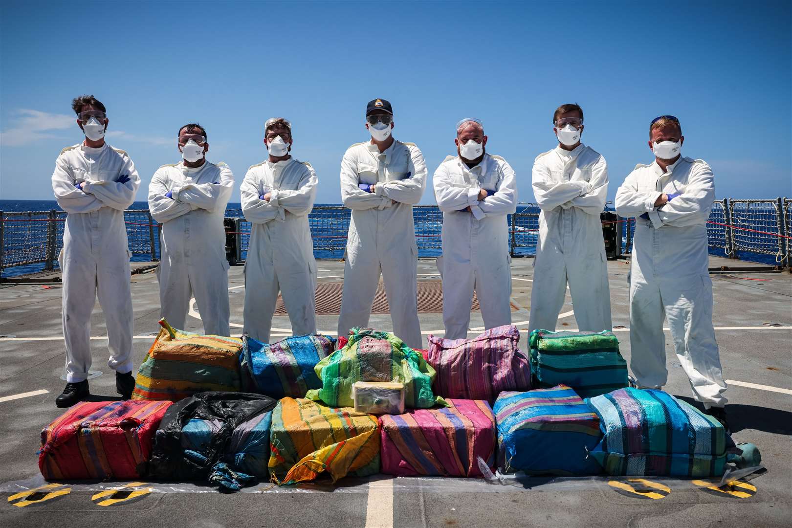 Sailors pose with seized cocaine from a narco-sub in the Caribbean (MOD/Crown Copyright2024/LPhot Matt Bradley/PA)