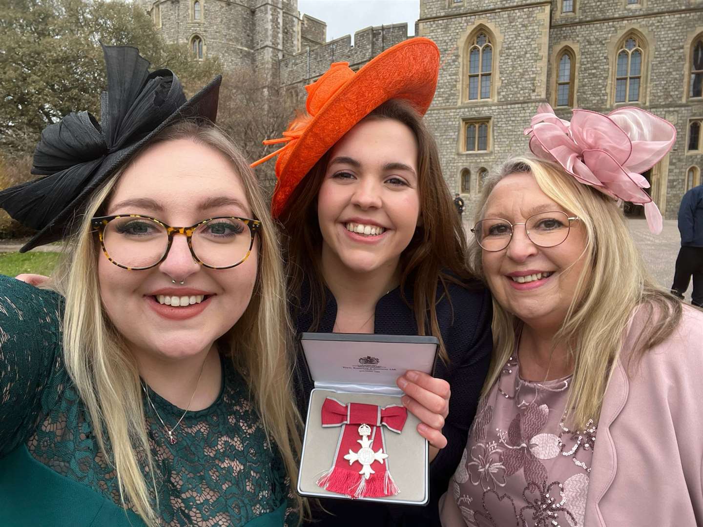 Charlotte Nichols(centre) with sister Ciara (left) and mother Sally after the ceremony (University of Bristol/PA)