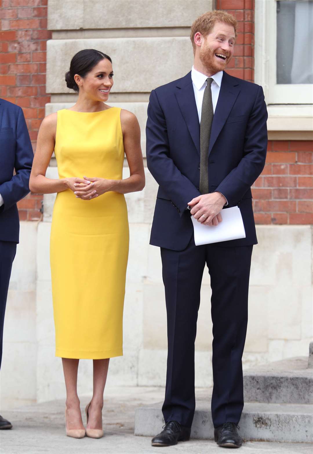 Meghan in a yellow outfit reception at Marlborough House reception (Yui Mok/PA)