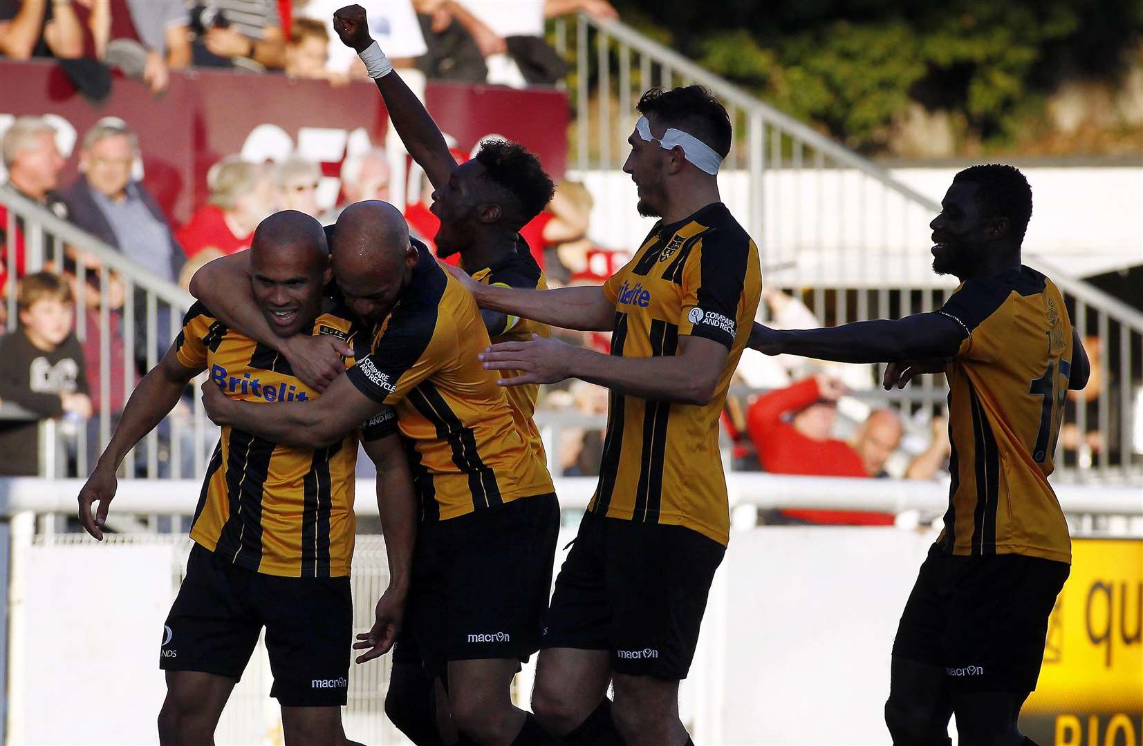 Elliott Romain, left, celebrates his goal against Leyton Orient Picture: Sean Aidan