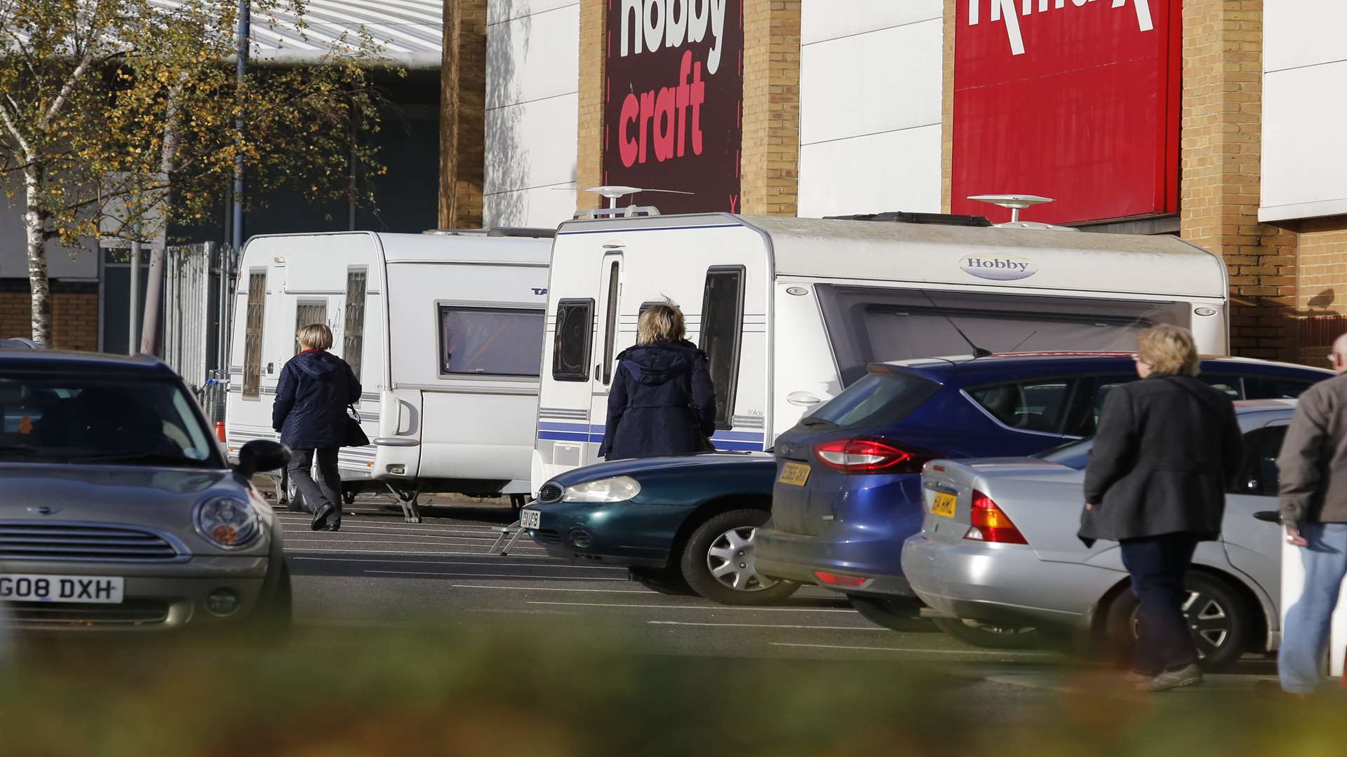 Travellers have moved into the car park