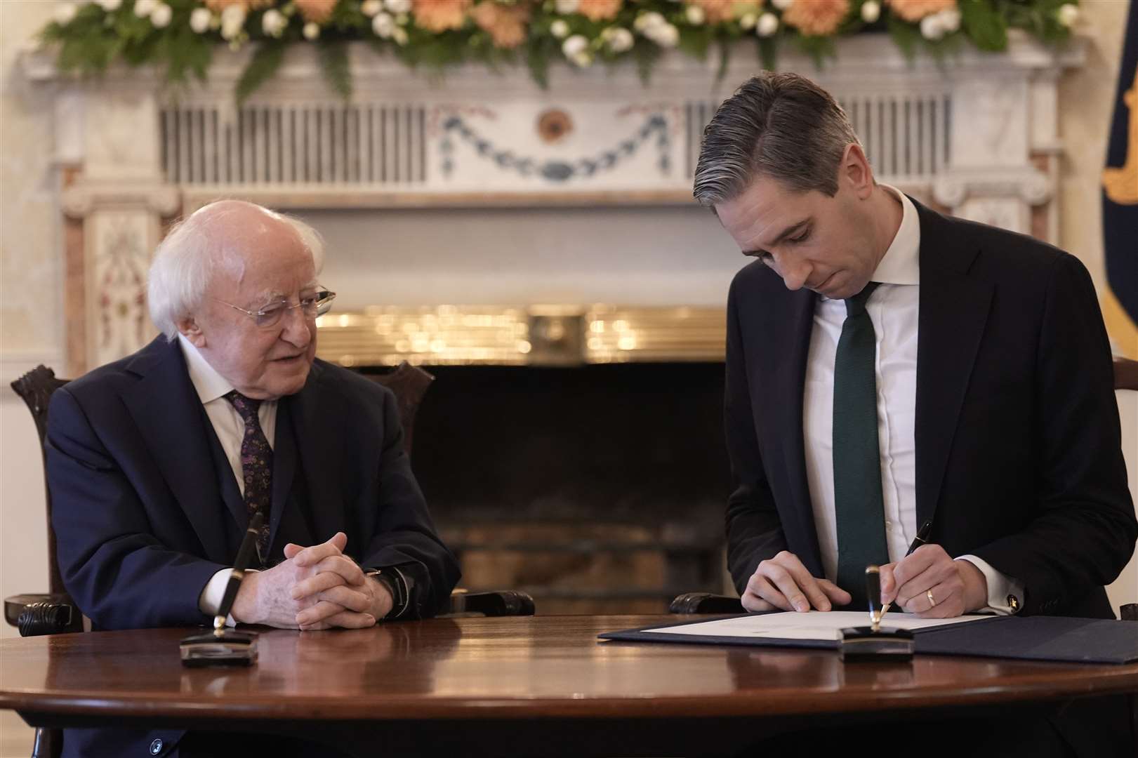 President Michael D Higgins and Taoiseach Simon Harris (Liam McBurney/PA)