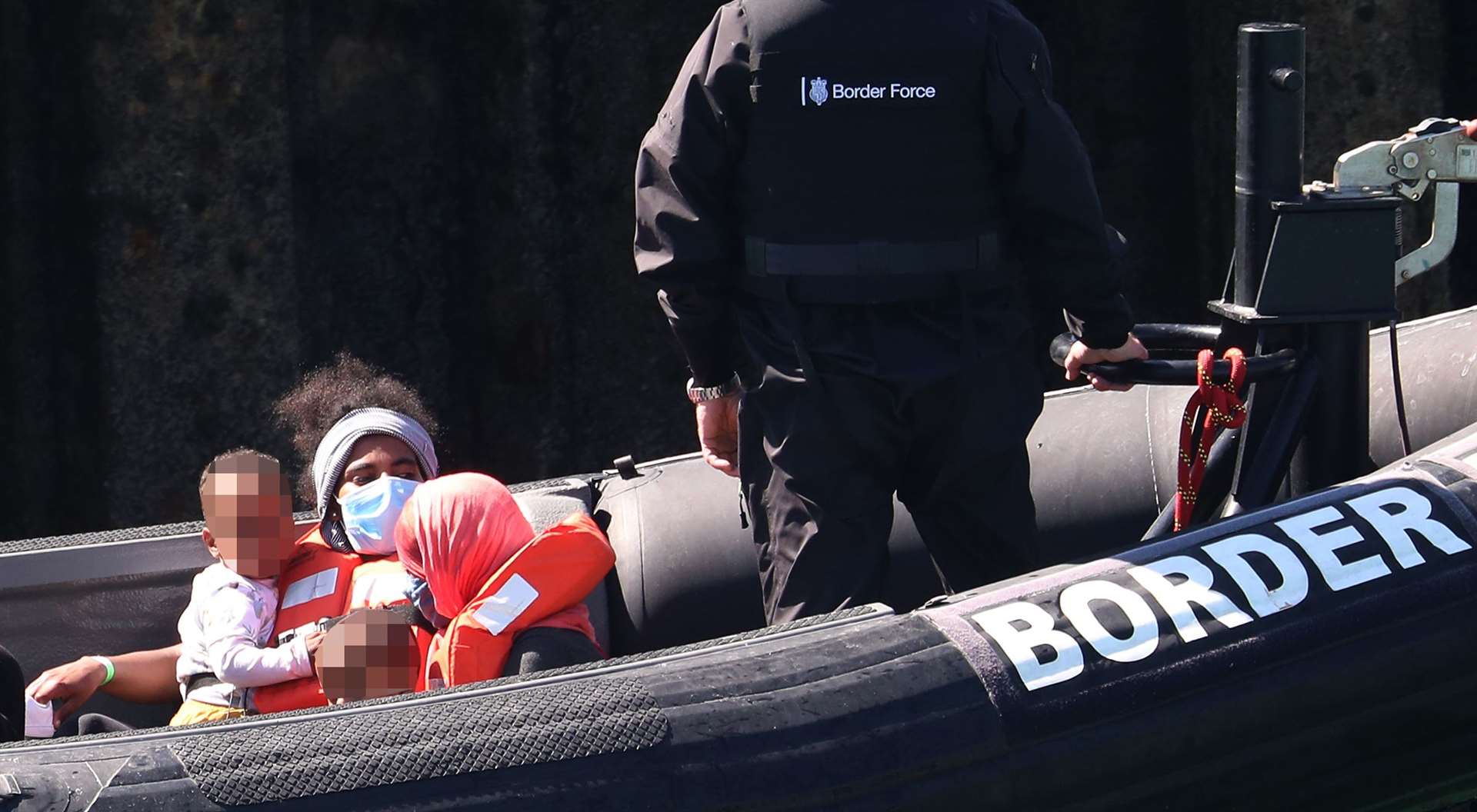 A Border Force vessel brings a group of people thought to be migrants in to Dover, Kent (Gareth Fuller/PA)