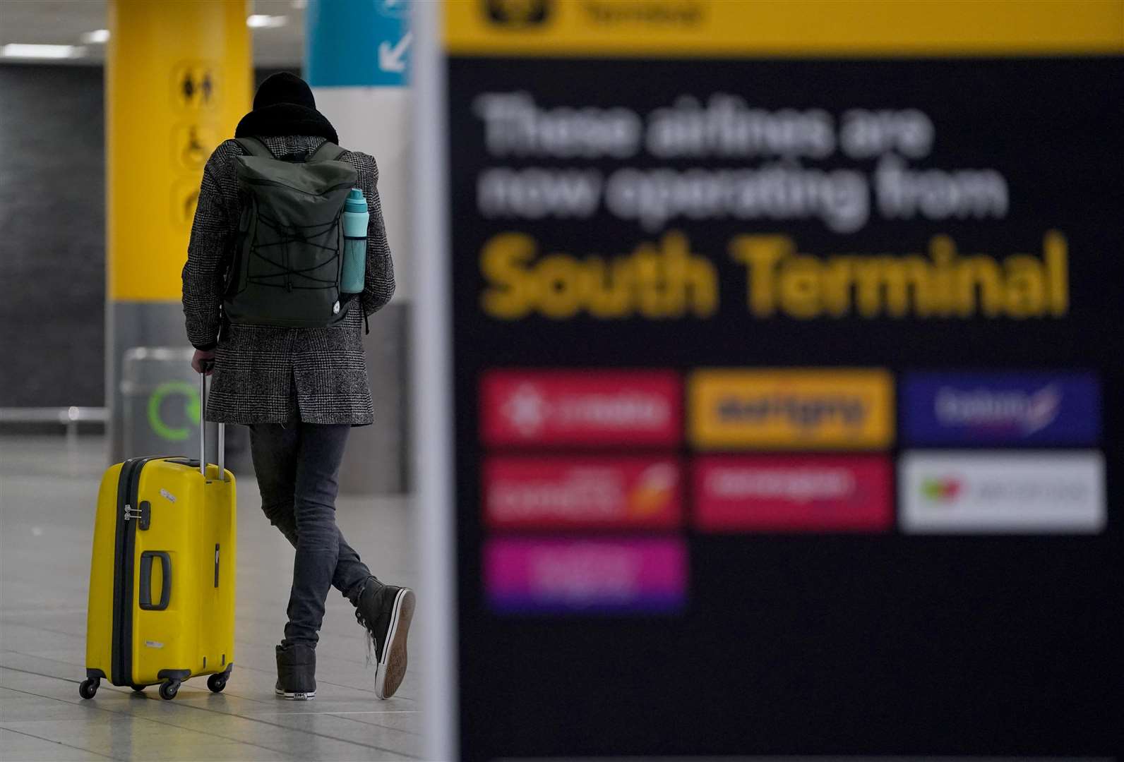 Passengers arrive at the south terminal of Gatwick Airport in West Sussex (Gareth Fuller/PA)