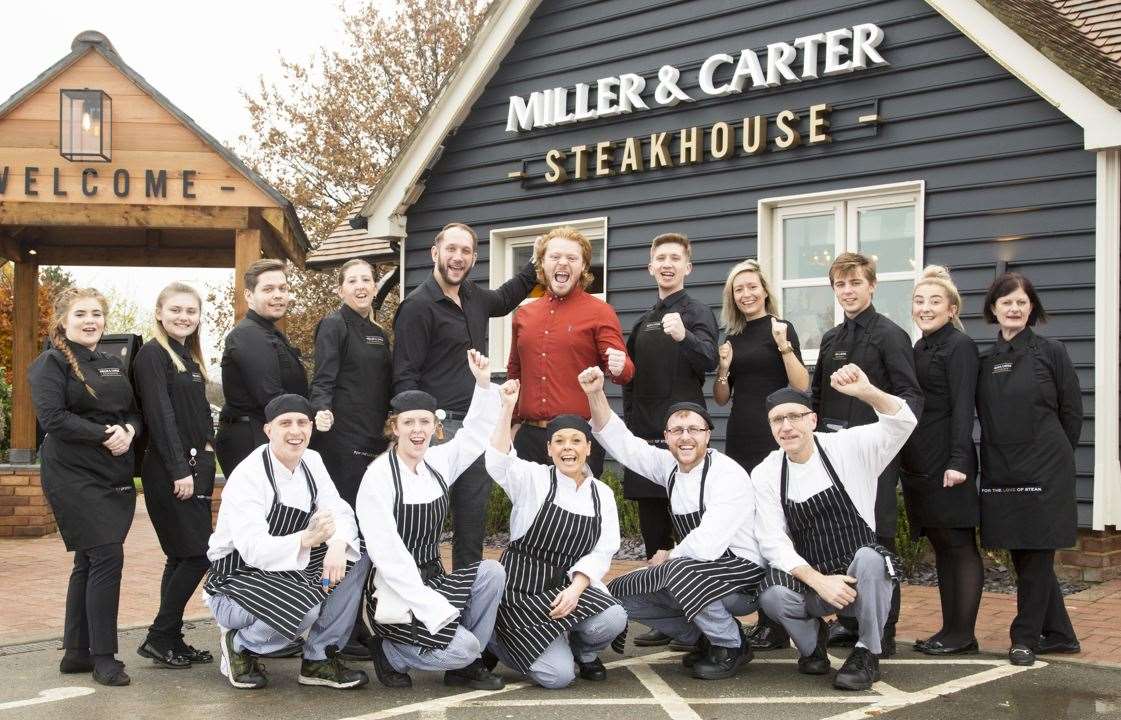 Staff looking happy to start serving their first guests