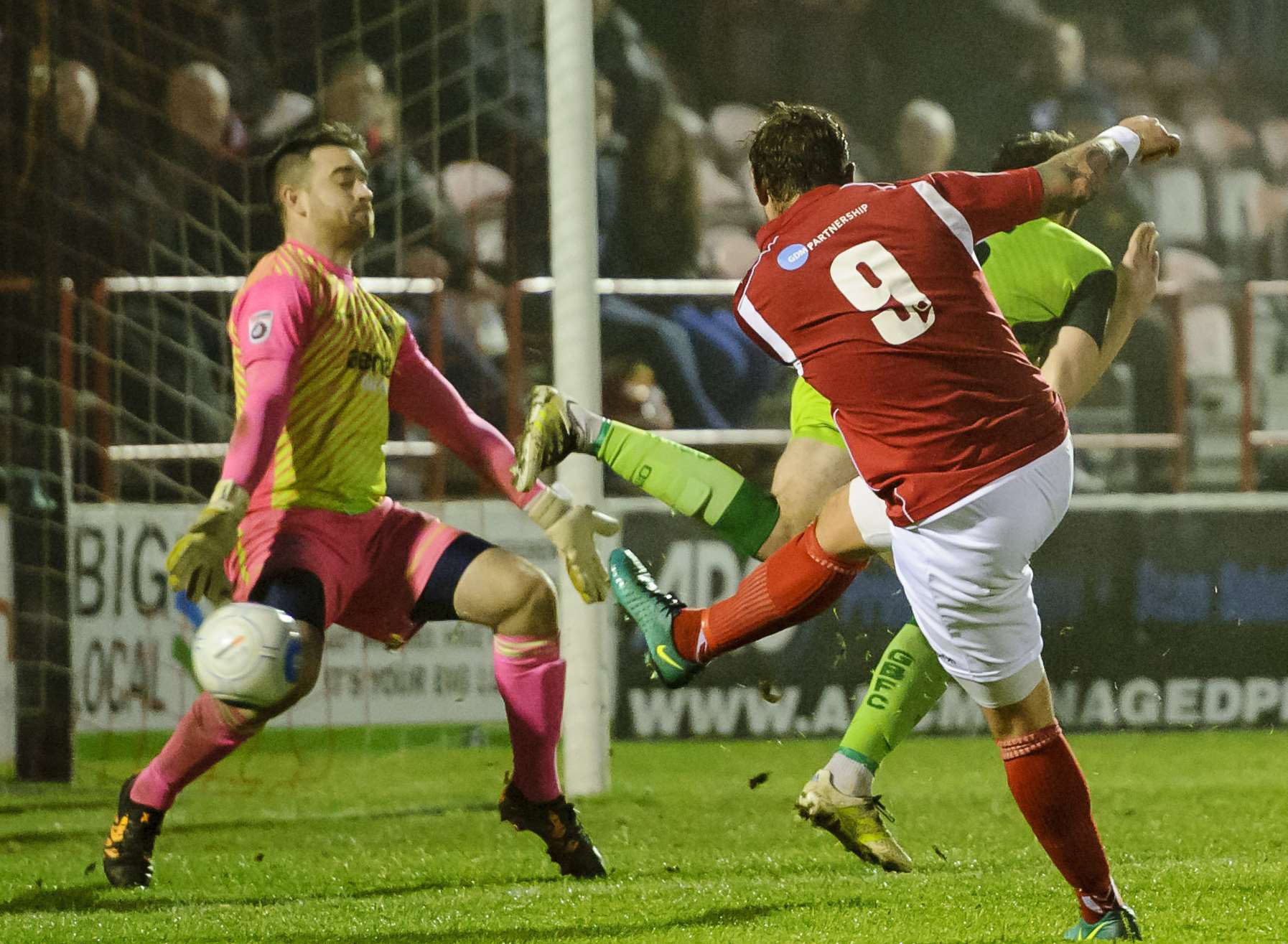 Fleet skipper Danny Kedwell is denied by Gosport keeper Nick Jordan. Picture: Andy Payton