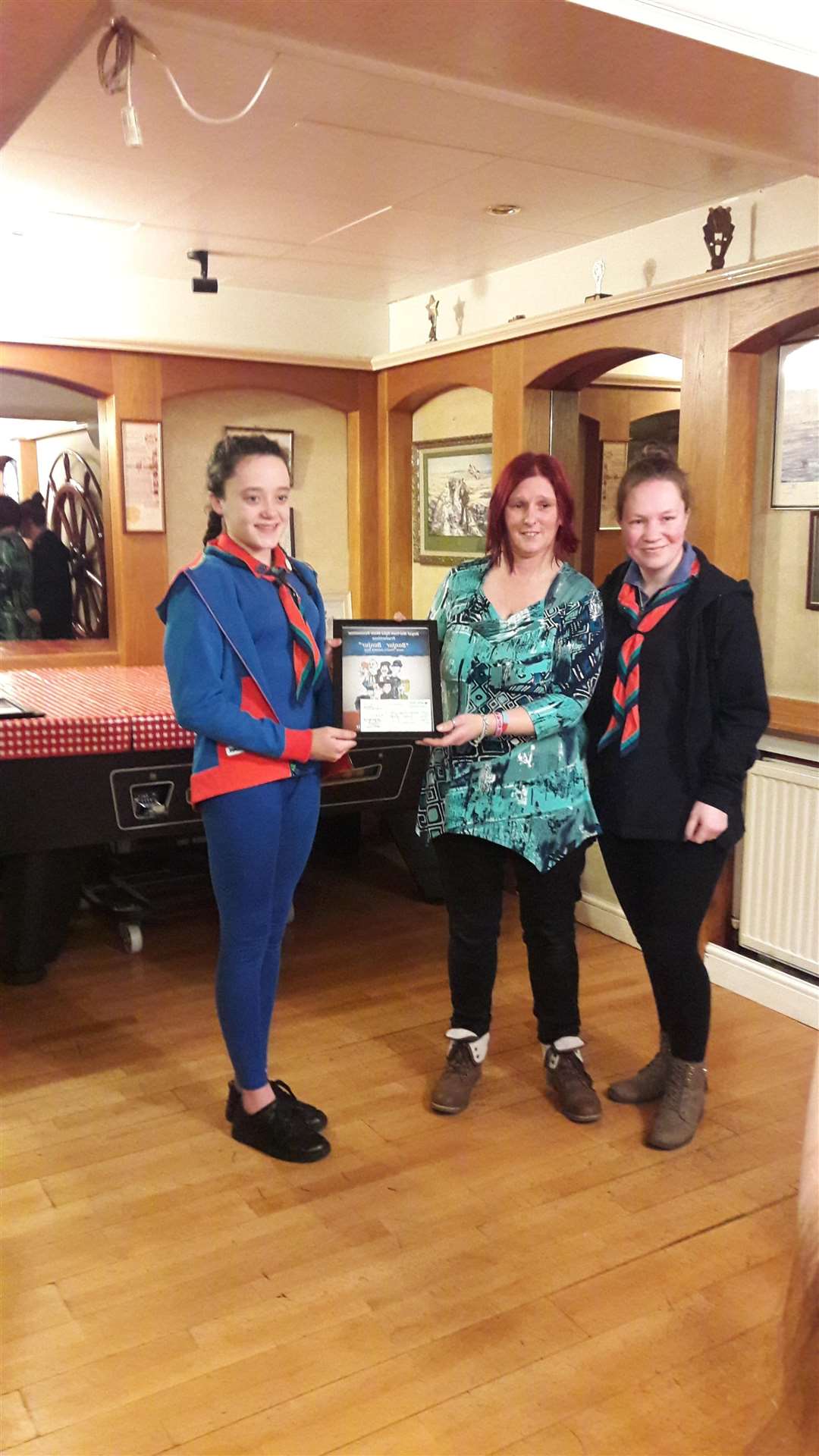 Two cheques for £300 were donated to guiding. Pictured here is Jaime Cooper receiving one for 1st Walmer Guides and a second one for Jade Hamilton for South Goodwin Division as a whole
