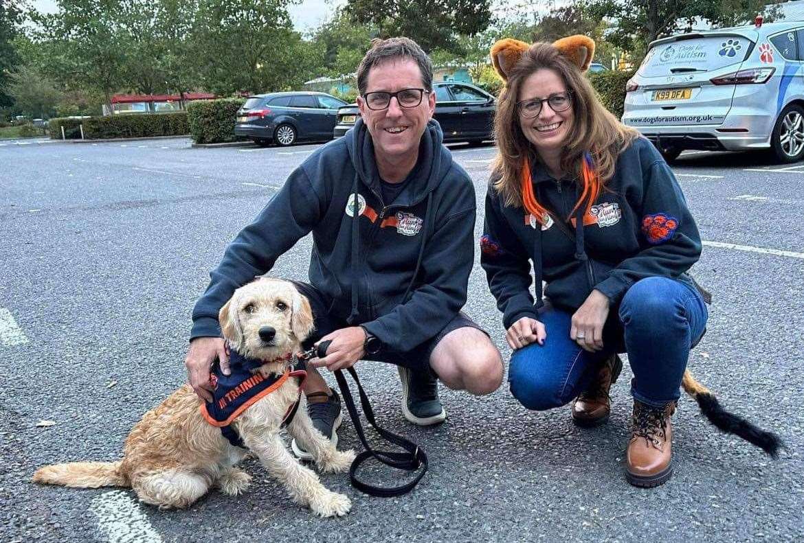 Event organisers "Lord and Lady of the Ring" John Emberton and Amanda Culley and pup in training Dubber