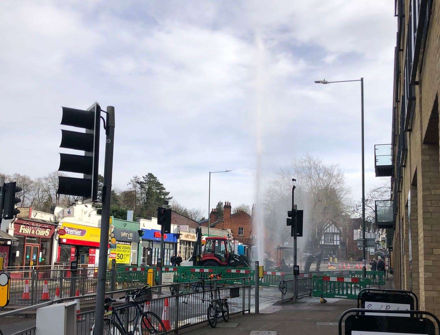 The burst water main shooting water out, close to Sevenoaks Railway Station. Picture: Stuart Wigley