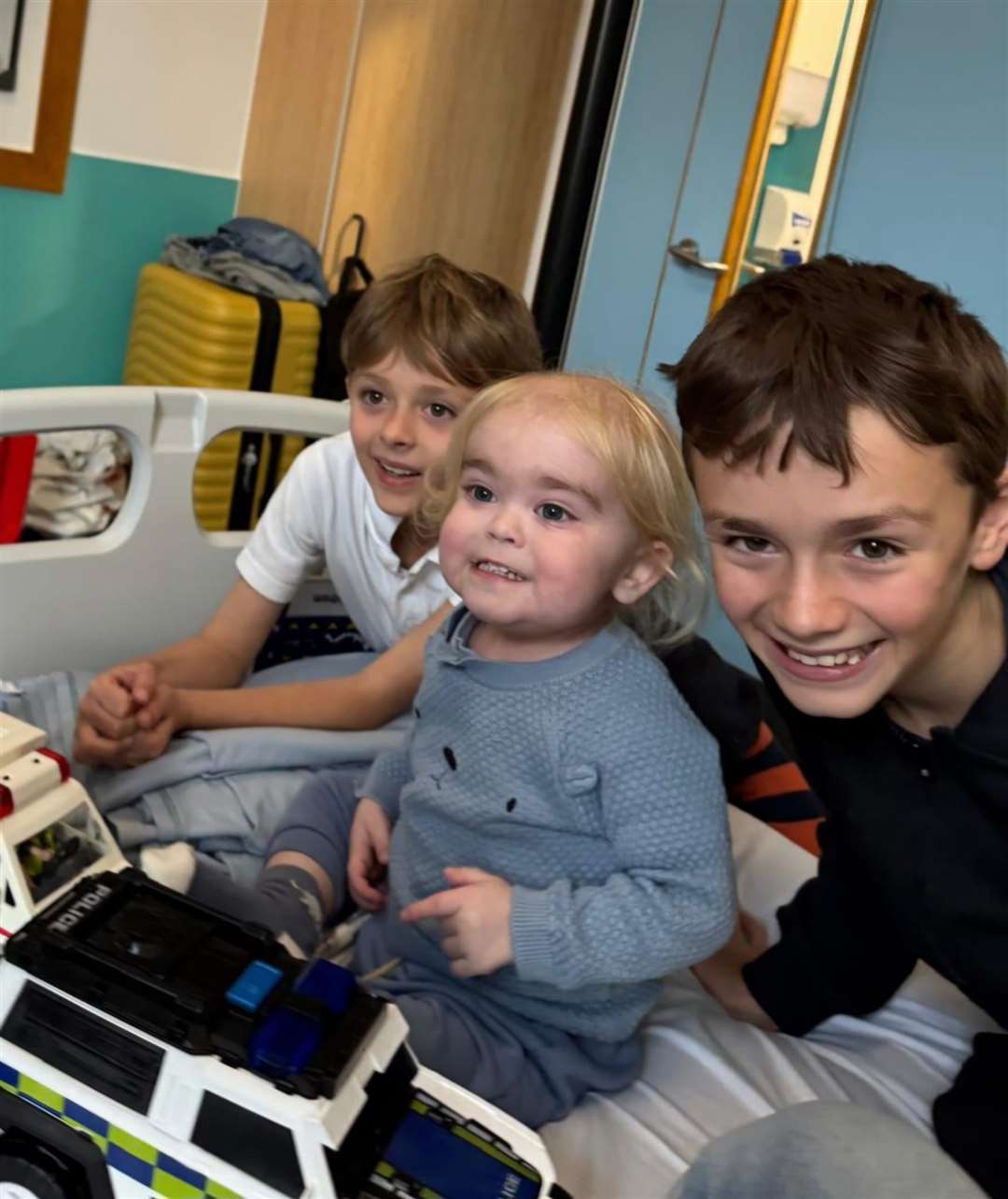 Alfie’s brothers Bobby (left) and Teddie with Alfie during a hospital visit (Handout/PA)