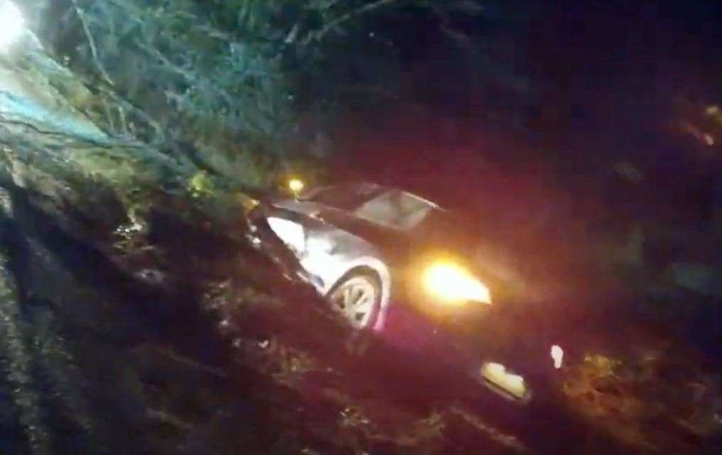 A car hit a tree and ended up in a ditch in Brenchley near Tonbridge. Picture: Kent Police