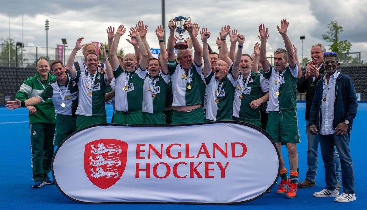 Canterbury Hockey Club’s men's over-50s lift the National Masters Cup. Picture: Alistair MacKinnon