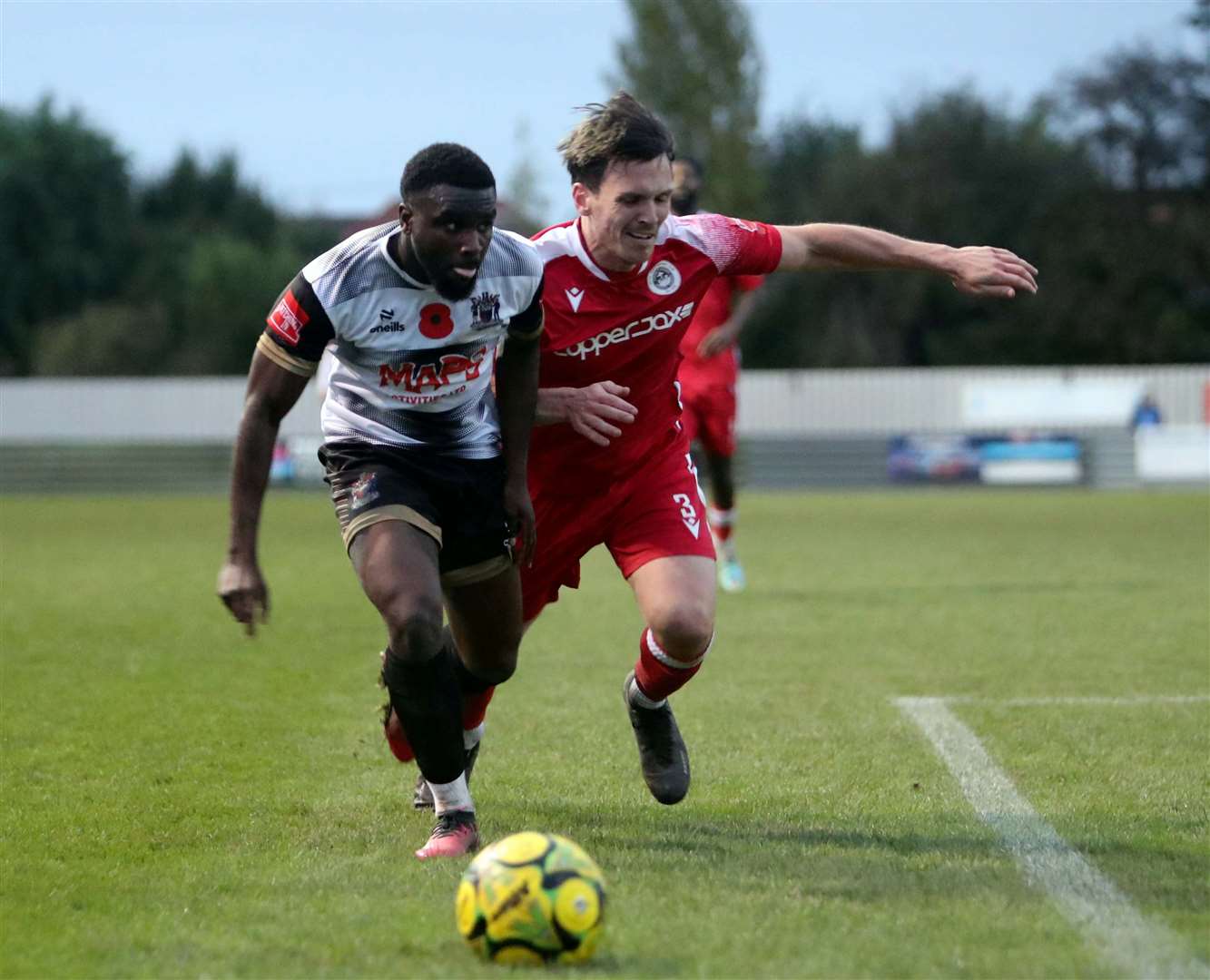 Two-goal Deal man Ife Oni takes on Hythe defender Tom Carlse. Picture: Paul Willmott