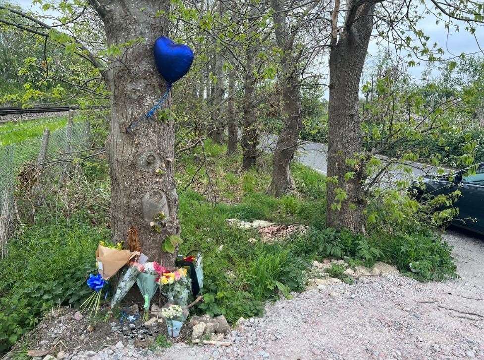 Balloons and flowers left along Lower Road, Teynham