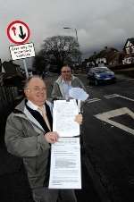 Tony Monk and Cllr Brian Mortimer with the petition. Picture: Matthew Reading