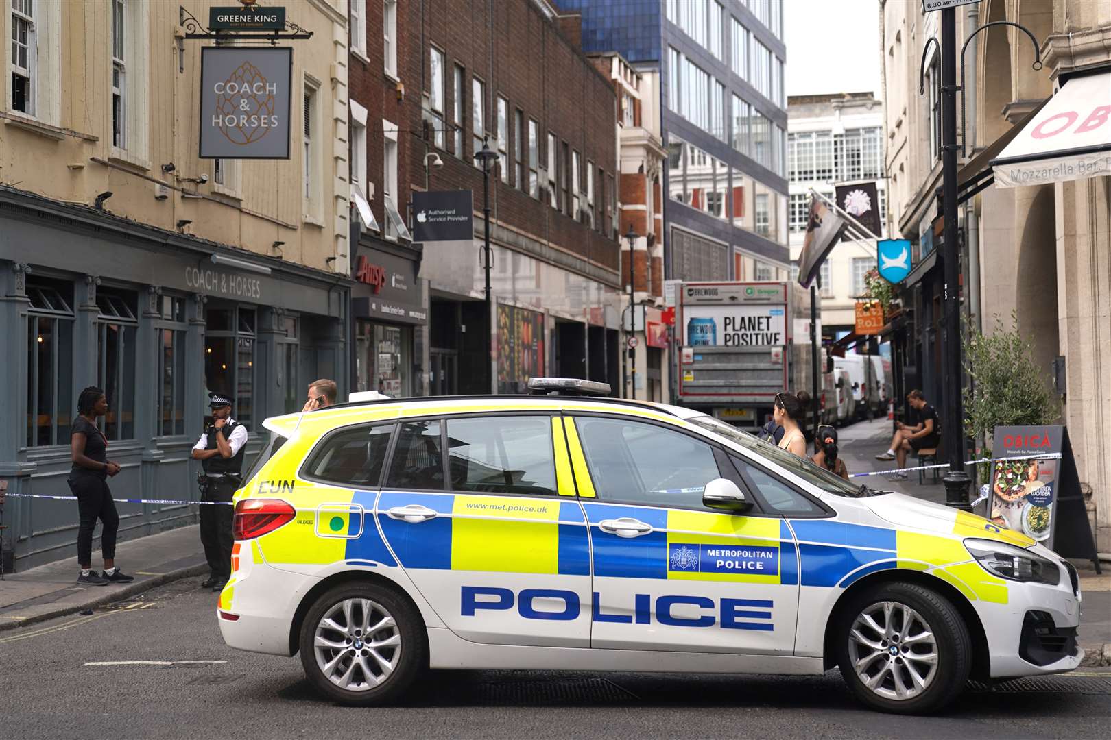 The police cordon at Poland Street (Victoria Jones/PA)