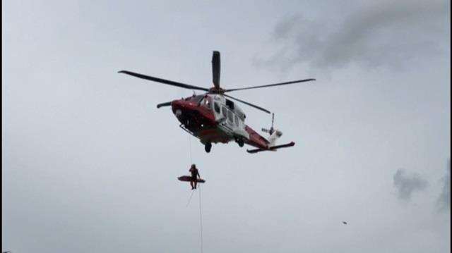 The casualty is winched to safety at Minster Cliffs