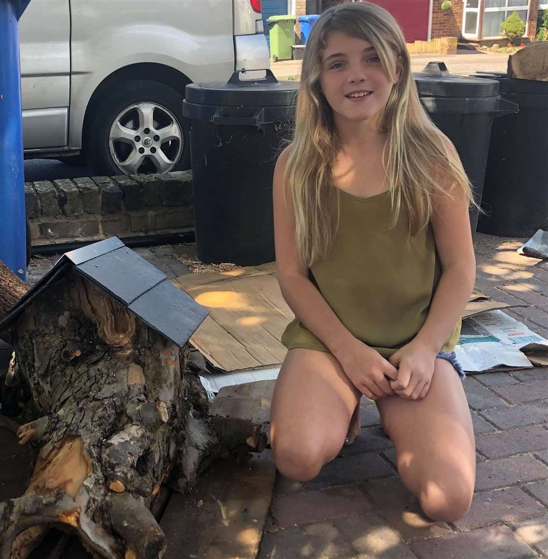 Karalynn Crosswell, 10, from Sittingbourne, with one of the hedgehog homes