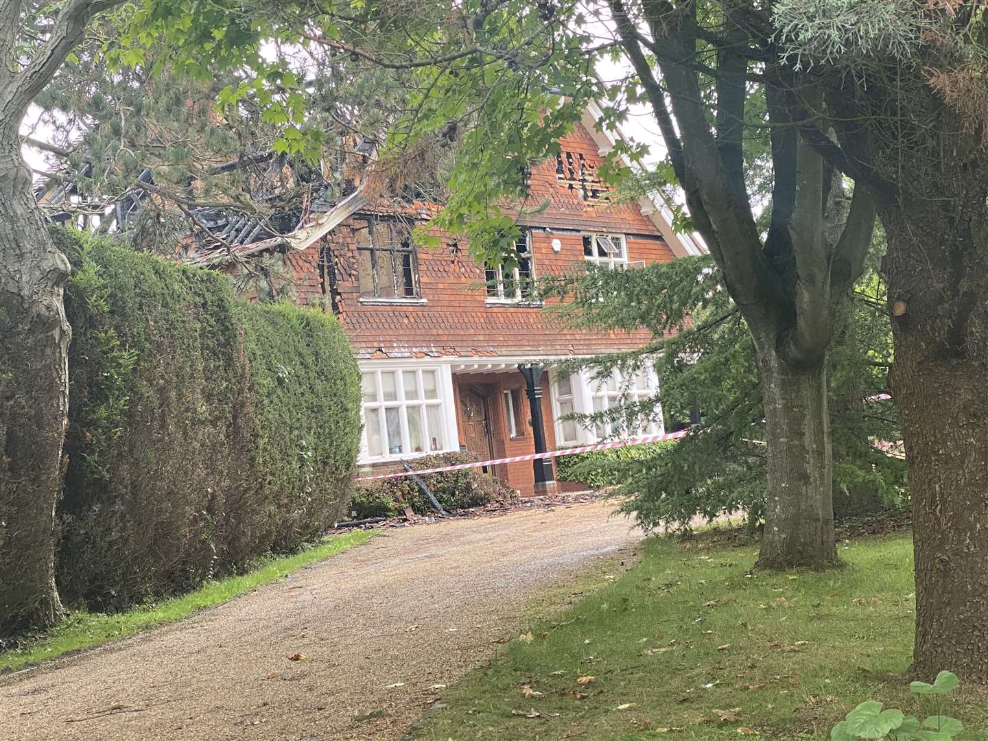 The gutted ruins of the house in Wrotham which was damaged by fire overnight