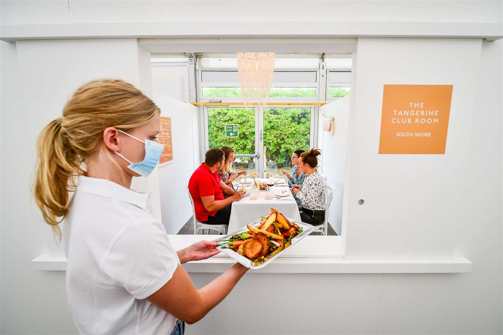 Servers will deliver food through a hatch to diners (Ben Birchall/PA)