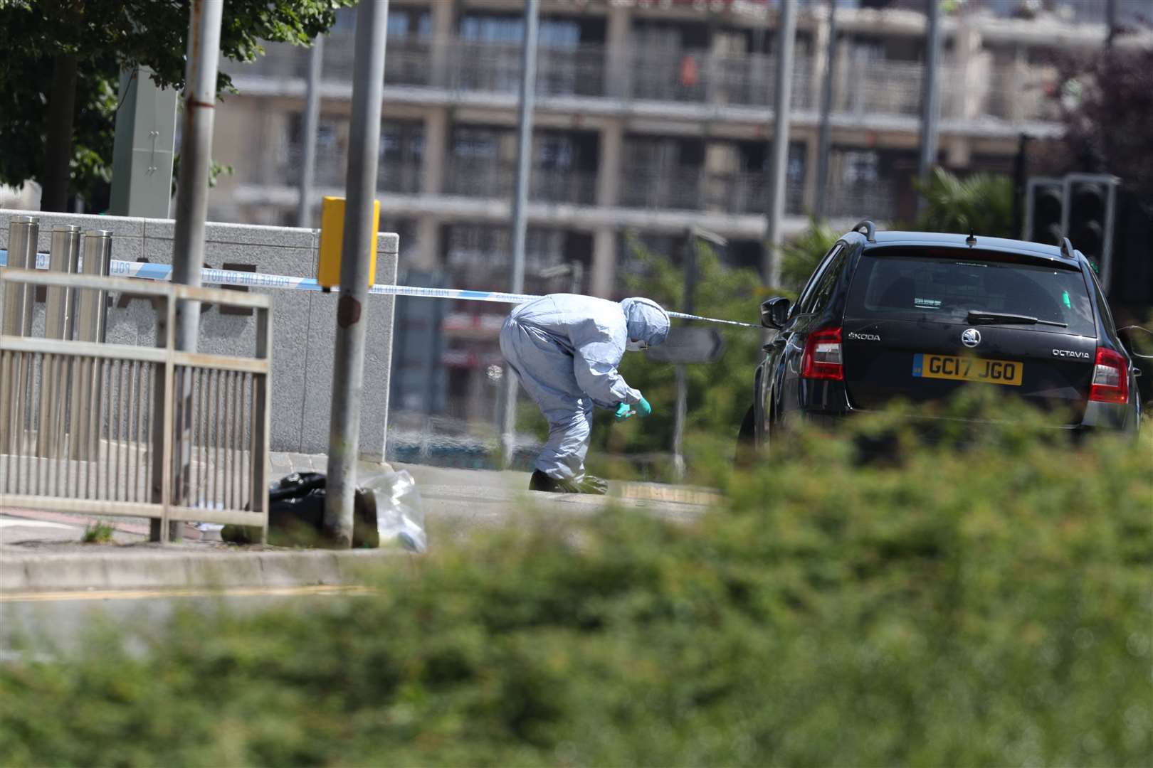 Police forensics officers at work near Forbury Gardens in Reading (Steve Parsons/PA)